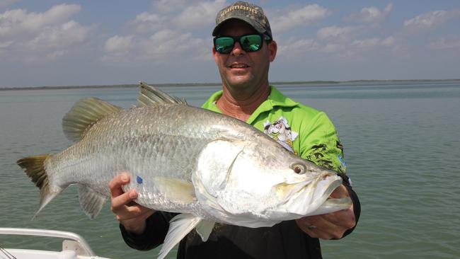 Chris Errity with a healthy looking 92cm barra.