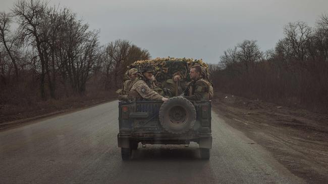 Ukrainian servicemen on a road near the frontline town of Chasiv Yar, Donetsk region, last week. Picture: AFP