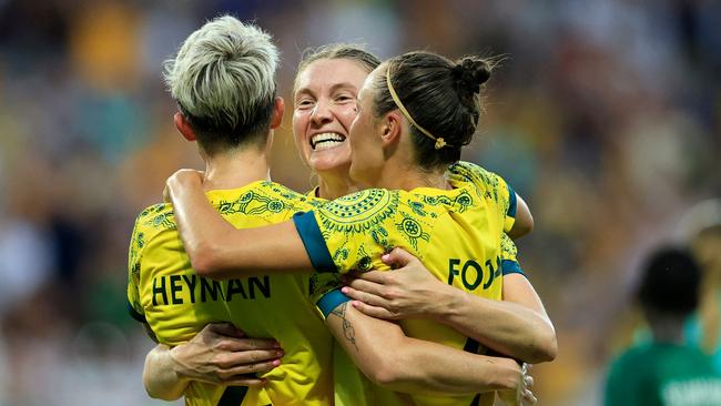 Australia's forward #02 Michelle Heyman celebrates scoring her team's sixth goal with teammates in the women's group B football match between Australia and Zambia during the Paris 2024 Olympic Games at the Nice Stadium in Nice on July 28, 2024. (Photo by Valery HACHE / AFP)