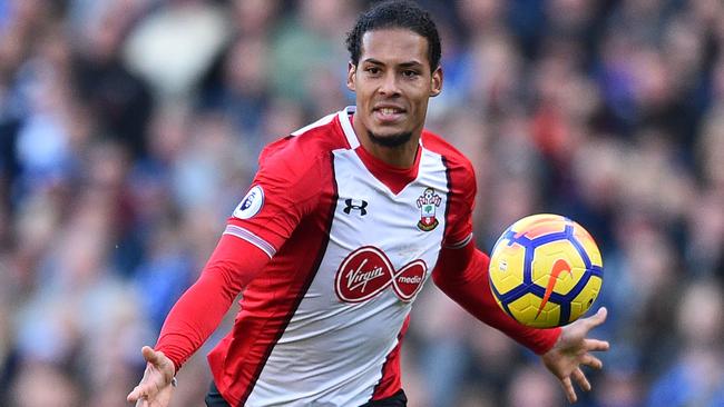 (FILES) This file photo taken on October 29, 2017 shows Southampton's Dutch defender Virgil van Dijk chases the ball during the English Premier League football match between Brighton and Hove Albion and Southampton at the American Express Community Stadium in Brighton, southern England on October 29, 2017. Liverpool have signed Southampton's Virgil van Dijk, a statement on the club's website said on December 27, 2017, for a reported £75 million ($100 million, 84 million euros) in a deal that will make him the world's most expensive defender. / AFP PHOTO / Glyn KIRK / RESTRICTED TO EDITORIAL USE. No use with unauthorized audio, video, data, fixture lists, club/league logos or 'live' services. Online in-match use limited to 75 images, no video emulation. No use in betting, games or single club/league/player publications.  /