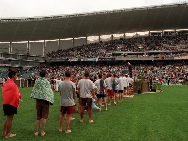 Members line up for the baptism ceremony at “God's Way Of Life”, the annual Jehovah’s Witness convention at Sydney Football Stadium in 1998.