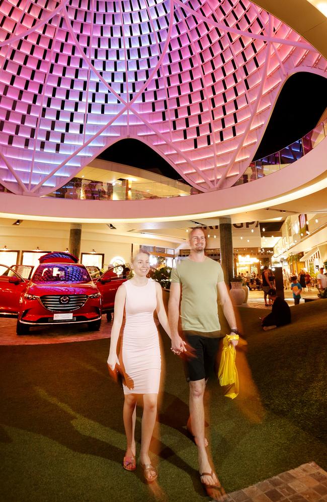 Kasey Mooney and Ben Waite of Chermside enjoy the new Westfield Chermside Extension. Picture: AAP