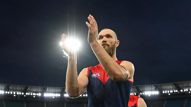 MELBOURNE, AUSTRALIA – APRIL 18: Max Gawn of the Demons celebrates winning the round five AFL match between the Hawthorn Hawks and the Melbourne Demons at Melbourne Cricket Ground on April 18, 2021 in Melbourne, Australia. (Photo by Quinn Rooney/Getty Images)