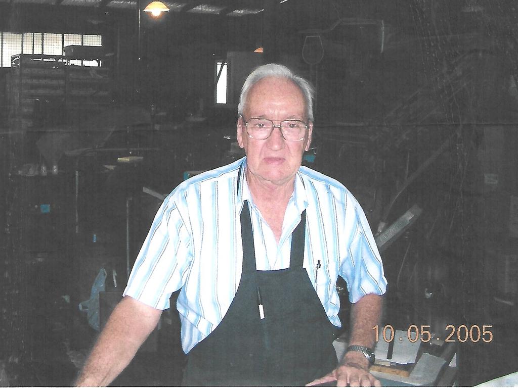 Stewart Macdonald in 2005, surrounded by old printing machines