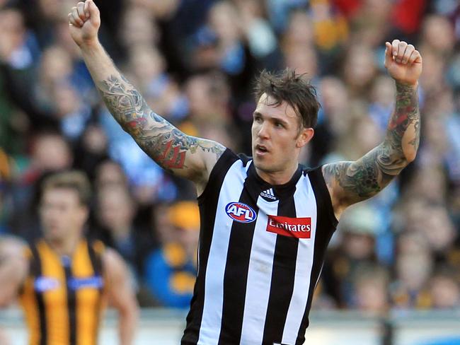 Swanny celebrates in the Pies’ 2012 traditional jumper. Picture: AAP