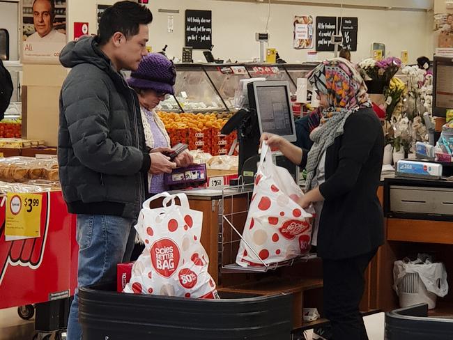 Shoppers at Coles Picture: Justin Lloyd.