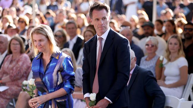 Premier Chris Minns and his wife Anna lay white roses at the memorial in front of the large crowd. Picture: Damian Shaw