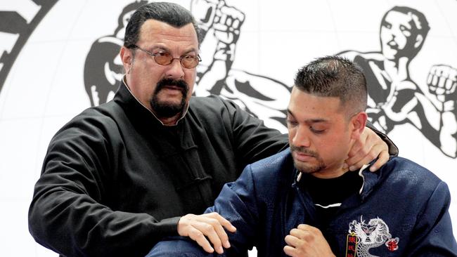 Steven Seagal runs through some training techniques with fans at Hammer’s Gym at Nunawading. Picture: Andrew Henshaw