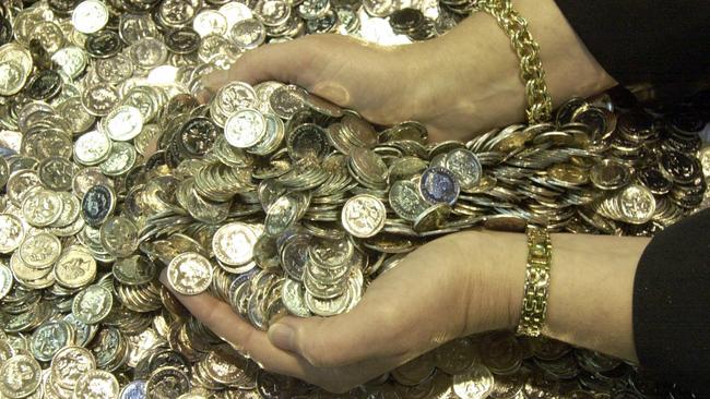 Freshly produced 5c coins at the Royal Australian Mint. Picture: Ray Strange.