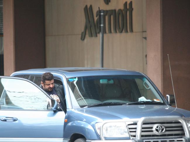 Falanga pictured getting into a Landcruiser outside the Marriott Hotel. Picture: Australian Federal Police.