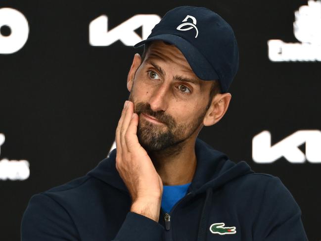 MELBOURNE, AUSTRALIA - JANUARY 24: Novak Djokovic of Serbia attends a press conference after retiring from the Men's Singles Semifinal against Alexander Zverev of Germany during day 13 of the 2025 Australian Open at Melbourne Park on January 24, 2025 in Melbourne, Australia. (Photo by Quinn Rooney/Getty Images)