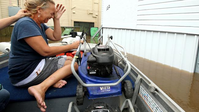 Lismore Floods. The streets of Lismore have been inundated with floodwater after the Wilson River overtopped the flood levee. Linda Kirk the moment she realised she had lost everything when her house was flooded in Lismore.   . Pic Nathan Edwards