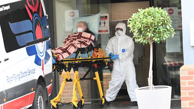 An Arcare Maidstone resident is wheeled to an ambulance. Picture: Rob Leeson.