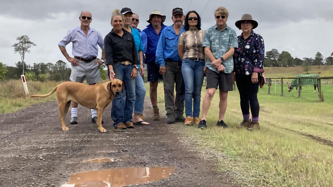 Kybong residents Richard Shutte, Melissa Flood, Cindy Medway, Ricky Frost, John Kenman, George Attard, Anna Wyroslak, Tony Kerr and Lyndall Kenman, who living along Lobwein and Glory Rds, are fuming over what they say is an ongoing lack of maintenance on their dirt road which has left it a corrugated and pot hole-littered mess.