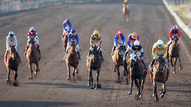 The Carlton Mid Darwin Cup (2000m) finish with winner, Gary Clarke trained Zahspeed riden by B.Davis.Picture by Patrina Malone