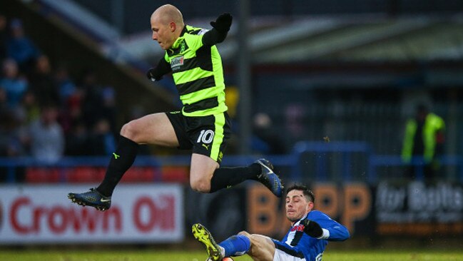 Robbie Slater has tipped Aussie Aaron Mooy’s Huddersfield to be one and done. Picture: Getty Images