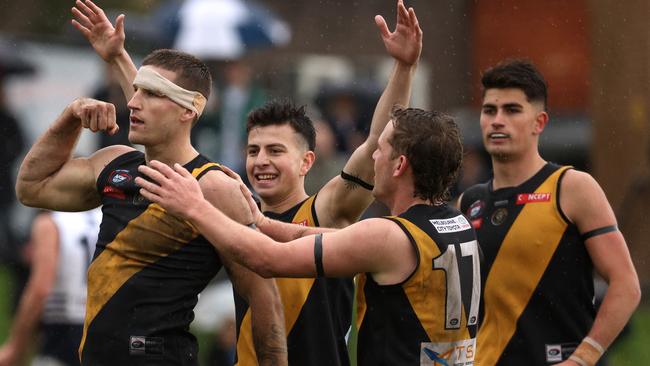 Brayden Sier celebrates a goal for Heidelberg in the grand final. Picture: Hamish Blair