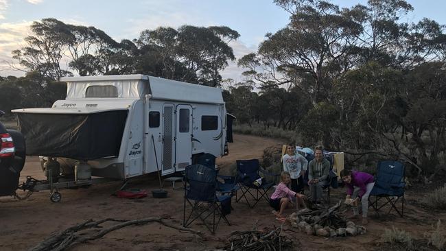 The Ayyuce family of Michelle, Olivia, 11, Riley, 9, and Abby, 7, at a free campsite at Penong in South Australia.