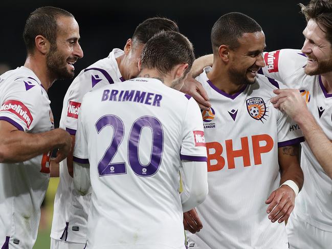 SYDNEY, AUSTRALIA - AUGUST 04: James Meredith of the Glory celebrates scoring a goal with team mates during the round 26 A-League match between the Western Sydney Wanderers and the Perth Glory at Bankwest Stadium on August 04, 2020 in Sydney, Australia. (Photo by Mark Metcalfe/Getty Images)