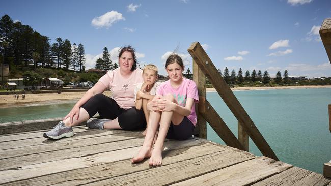 Locals, Tara Gray with her kids Riley Gray, 8, and Ariana Gray, 12, in Port Elliot, where the Horseshow Bay pontoon has been removed. Picture: Matt Loxton