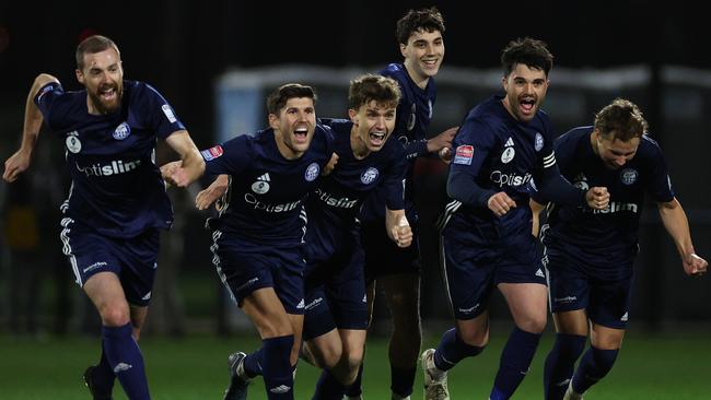 Oakleigh Cannons celebrate the Australia Cup win on penalties.