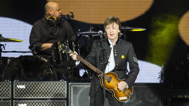 Rain didn’t deter McCartney fans, with 40,000 turning out to see the former Beatle in action in Brisbane.