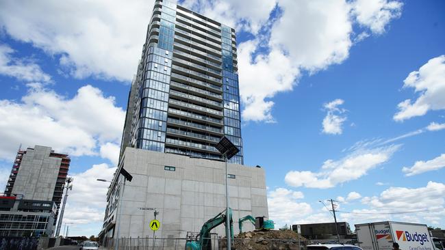 MELBOURNE AUSTRALIA - NewsWire Photos DECEMBER 28, 2024: Photo of Liberty 1 building in Footscray with diggers in the front where Liberty 2 was to be built. Homes under construction hang in balance as Bensons Property Group enters administrationPicture: NewsWire / Luis Enrique Ascui