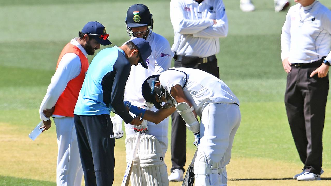 India's Mohammed Shami was struck on the arm by Pat Cummins.