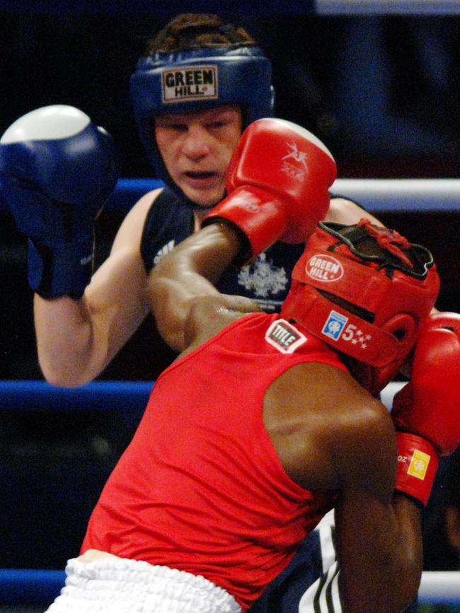 Australia's Luke Jackson fighting Namibia’s Gottlieb Ndokosho at the Commonwealth Games in 2006; and beating Ndokosho. Picture: AAP