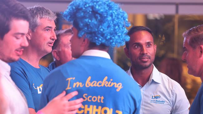 A concerned Hermann Vorster and Leon Rebello keeping an eye on the screens at Tallebudgera SLSC. Picture: Glenn Hampson.