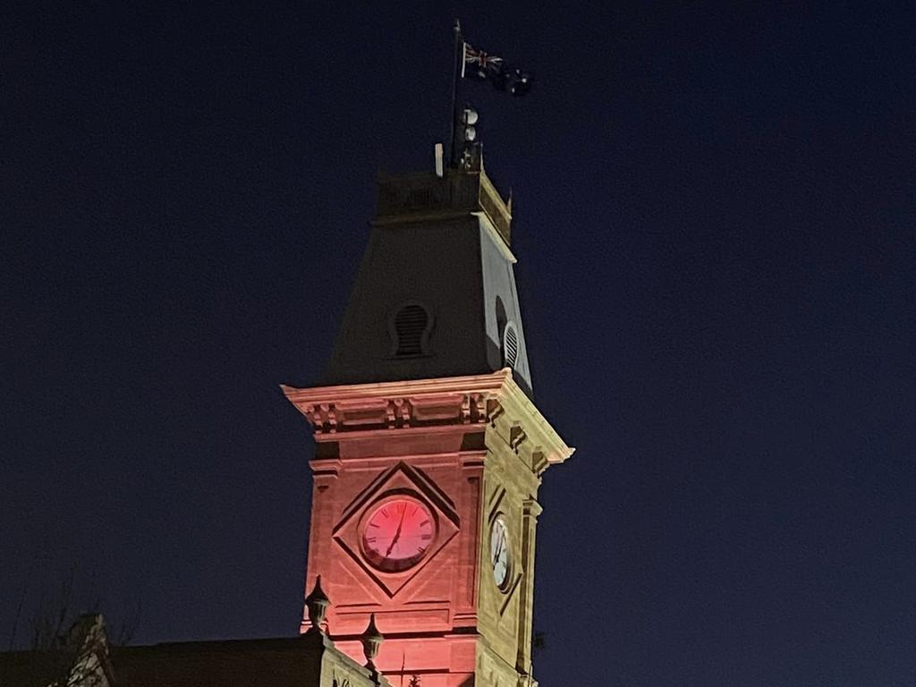 Warwick's Town Hall will remain florescent orange for 16 days to raise awareness of gender based violence. Photo: Supplied