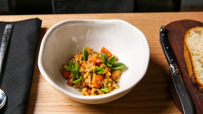 Just wow: Carrots poached in chicken stock and finished with roasted chicken skin crumble.