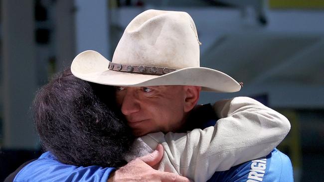 Jeff Bezos hugs his mother, Jacklyn Bezos, after his flight on Blue Origin. Picture: AFP