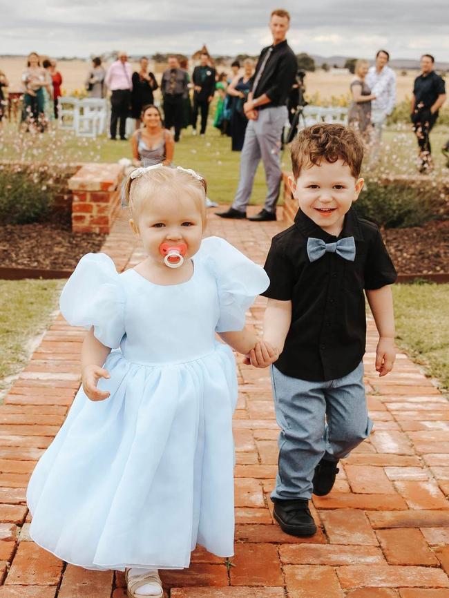 Adorable flower girl Bailey joins the couple’s little son Emerson, a page boy. Picture: Mikayla St Onge