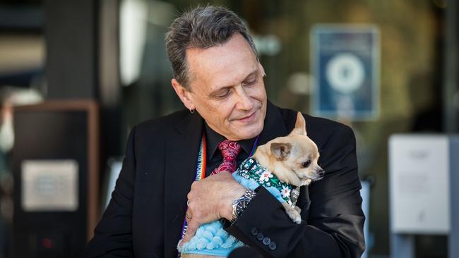 Andy Meddick with the dog at parliament. Picture: Getty Images