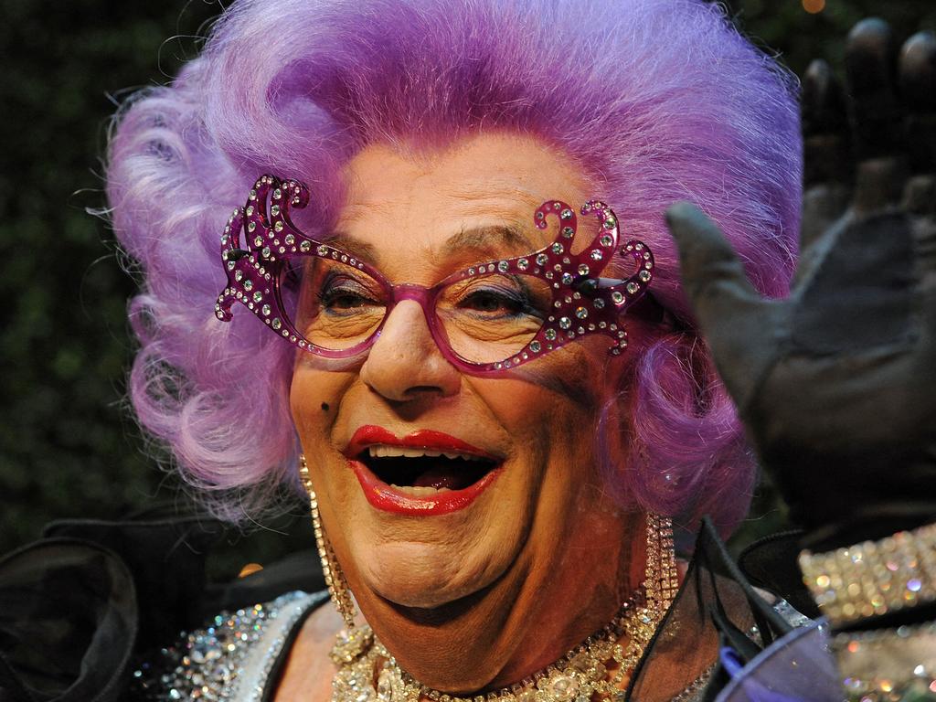 Barry Humphries, dressed as his alter ego, Dame Edna Everage. (Photo by Greg WOOD / POOL / AFP)