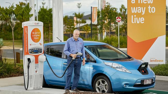 Yarrabilba resident Jim Barbey at the electric car charging bay.