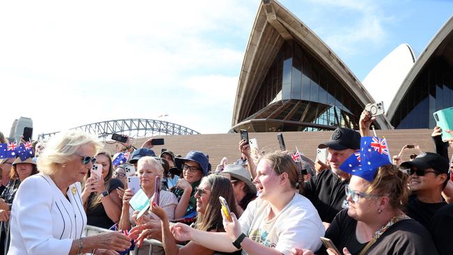 Queen Camilla greets spectators during a visit to the Sydney Opera House. Picture: Chris Jackson/Getty