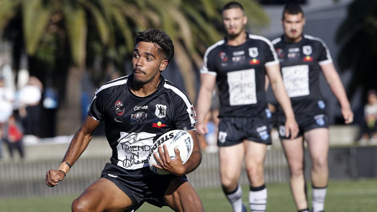 Redfern's TJ Speedy Coe on the run. Picture: John Appleyard