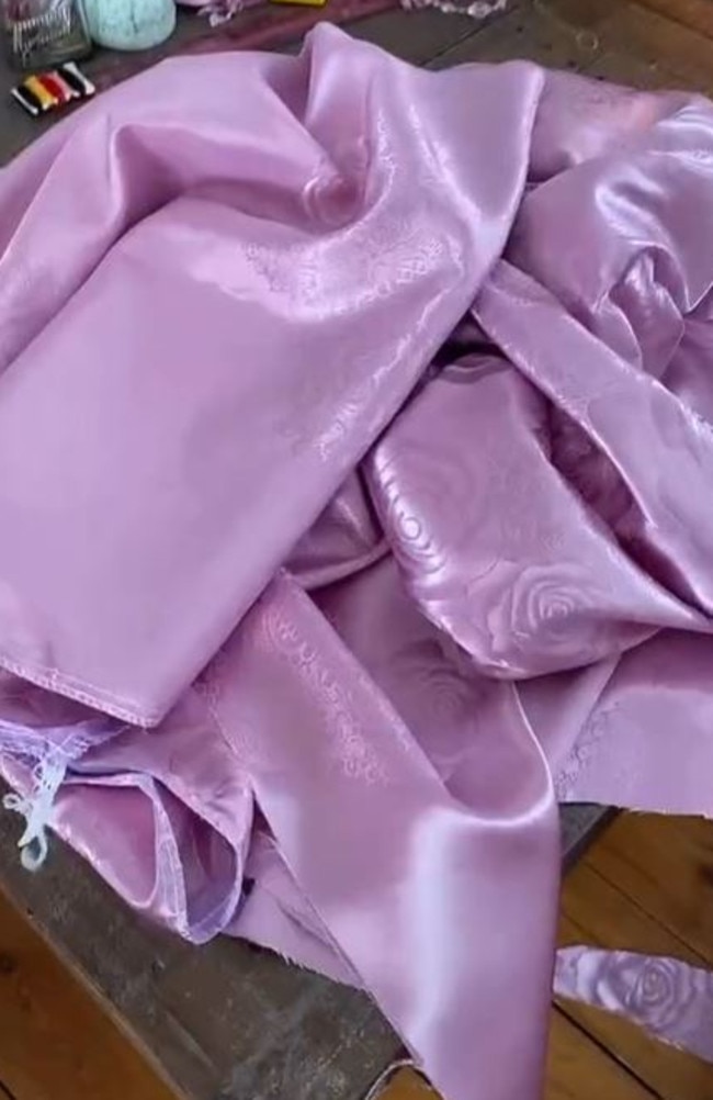 The star turned this pink tablecloth into a sexy cami top. Picture: TikTok