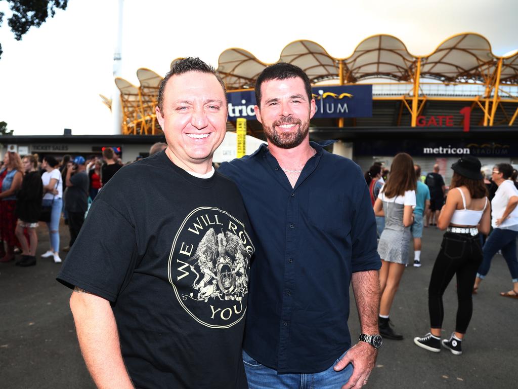 Chris Lee and Chris McDonald arrive at Metricon Stadium to see Queen Live. Photograph: Jason O'Brien