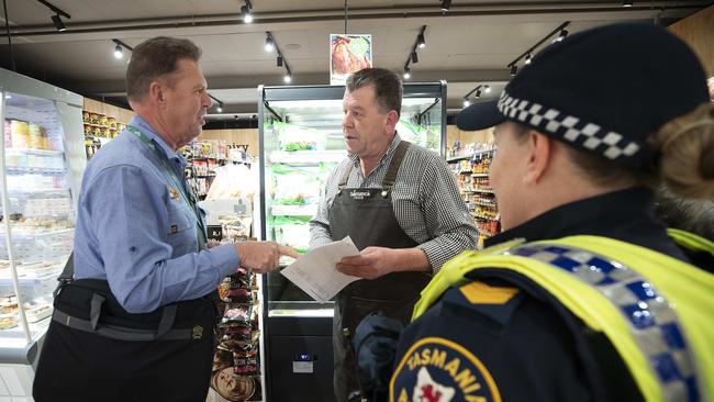 Work Safe Tasmania Inspector Glenn Duncan and Salamanca Fresh manager Terry Krambousanos during a routine Covid 19 business compliance inspection. Picture: Chris Kidd