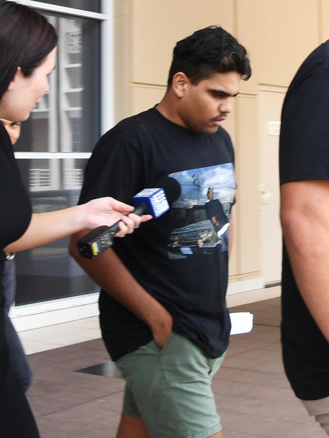 Nightcliff Tigers player Kian Wise leaves court surrounded by supporters after being granted bail following a late night brawl on Mitchell St on Christmas Eve.