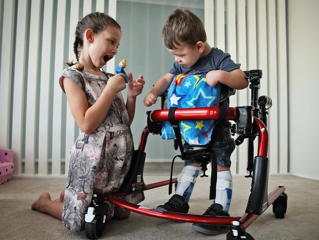 2 year old Bobby Webber pictured at his Western Sydney home today. Bobby suffered brain injuries after being attacked by his uncle when he was 7 months old. Bobby's sister Olivia on left.