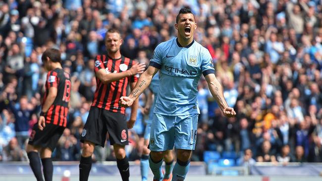 MANCHESTER, ENGLAND - MAY 10: Sergio Aguero of Manchester City celebrates after scoring his team's fourth goal from the penalty spot during the Barclays Premier League match between Manchester City and Queens Park Rangers at the Etihad Stadium on May 10, 2015 in Manchester, England. (Photo by Michael Regan/Getty Images)