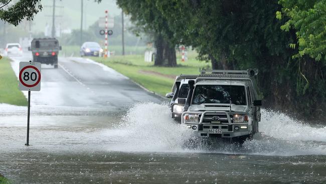 4WDs crossing the Mossman River at Foxton Bridge as the water recedes after TC Jasper in December 2023. Picture: Liam Kidston