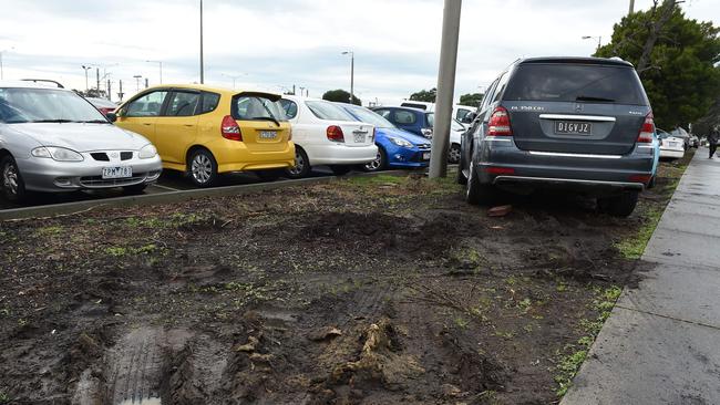 Cranbourne commuters go off-road to park their cars. Picture: Chris Eastman