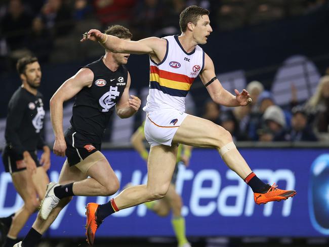 Adelaide’s Josh Jenkins kicks a goal against Carlton at Etihad Stadium. Picture: Michael Klein