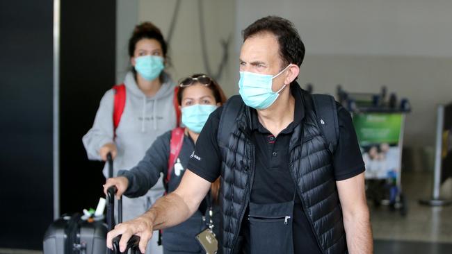 Passengers arrive at Melbourne Airport on Sunday. Picture: Stuart McEvoy