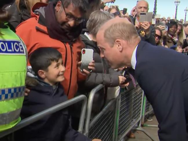 Prince William greets mourners on Lambeth Bridge, who are lining up to see the Queen's lying in state. Picture: Supplied